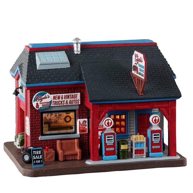 Lemax LED Multicolored Clyde's Trucking Service Christmas Village 6 in.